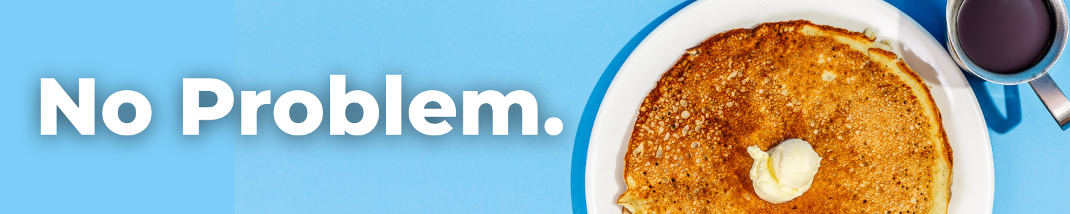 Photo of pancake with the words "No Problem."